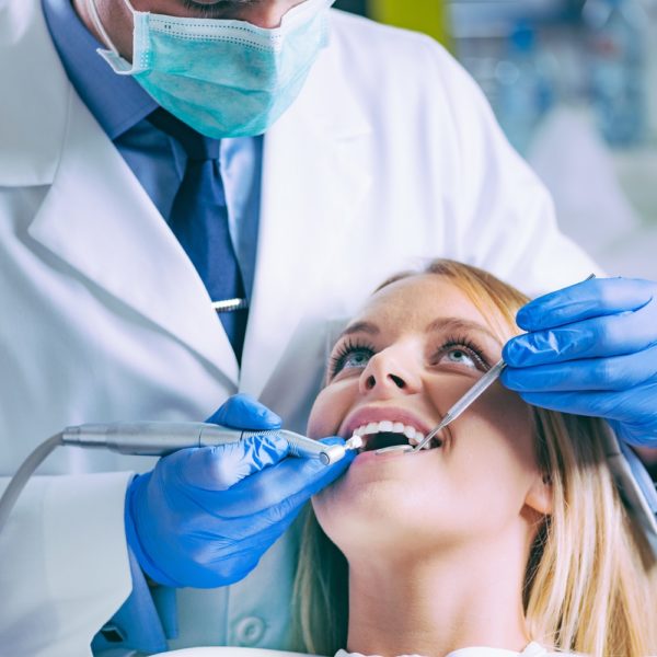 Dentist drilling teeth